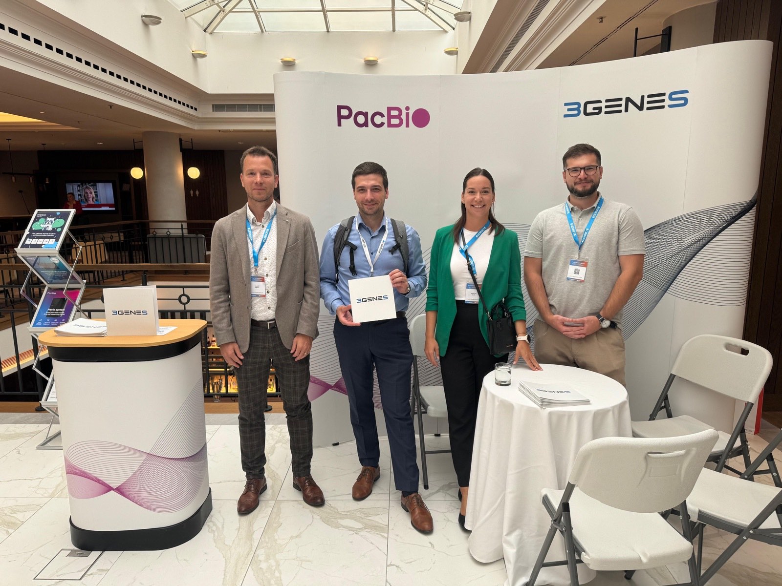 The 3GENES team at the PacBio booth at a conference